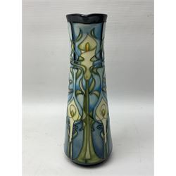 Moorcroft jug, of tapering form, decorated in the Calla Lily pattern by Emma Bossons, circa 2001, H24cm