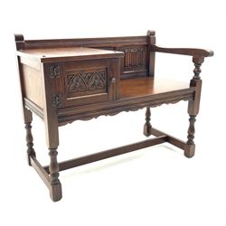 Old Charm - medium oak telephone table, linen fold panelled back, single cupboard, on turned supports joined by stretchers