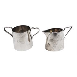 1930s silver twin handled open sucrier, of tapering cylindrical form, with curved handles, hallmarked Viner's Ltd, Sheffield 1932, together with an Edwardian silver milk jug, of angular form, hallmarked Joseph Gloster Ltd, Birmingham 1909, tallest H6cm