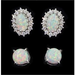 Pair of silver opal and cubic zirconia stud earrings and one other pair of opal stud earrings