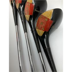 Golf - three early 20th century hickory shafted irons marked R. Simpson, Harrods Ltd etc; child's wooden shafted putter; two transitional wood grain steel shafted irons, one marked Tom Morris; and set of four Macgregor Tommy Armour woods (10)
