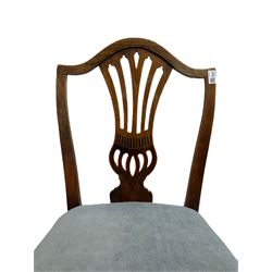 Early 19th century elm side chair, shaped cresting rail over vasiform splat with pierced decoration (W53cm, H96cm); Hepplewhite period mahogany side chair, shield back with pierced splat, on square tapering supports with spade feet (W55cm, H99cm); George III walnut elbow chair, shaped cresting rail and moulded frame, upholstered drop-in seat, on square supports with inner chamfer (W59cm, H95cm) (3)