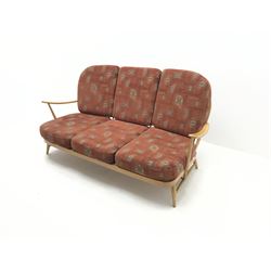 Ercol three seat Windsor sofa with loose cushions, spindle back, turned supports