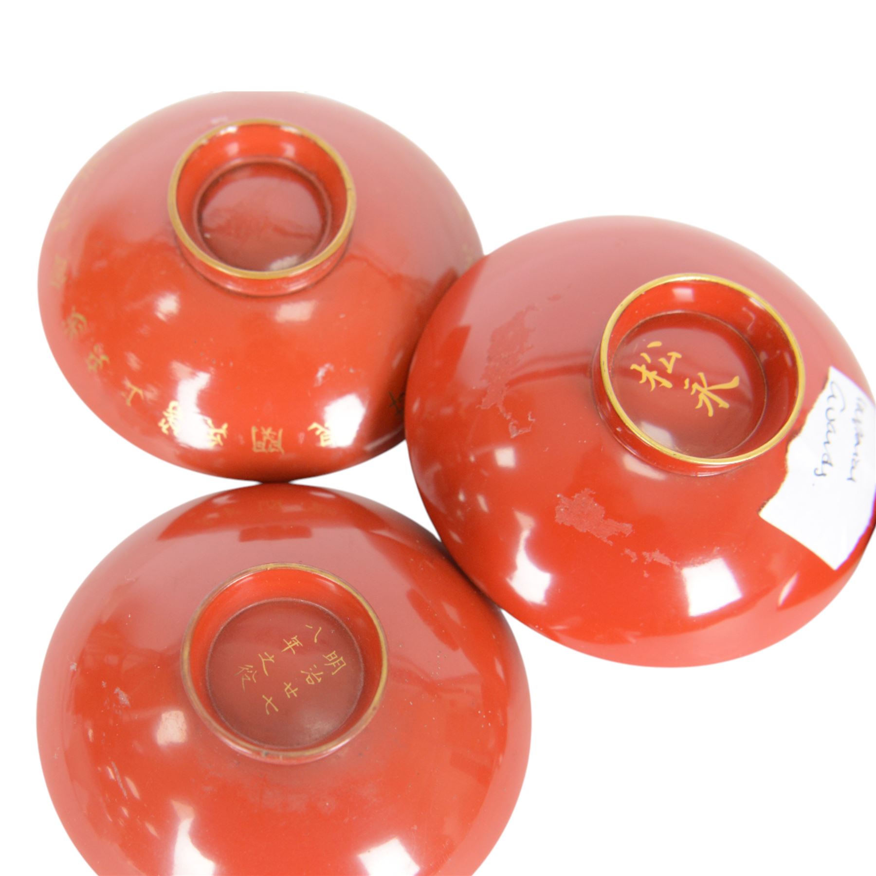 Five red lacquered saki bowls, together with five porcelain examples, red lacquered D9cm