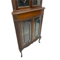 Edwardian mahogany corner display cabinet, scrolled swan neck pediment over astragal glazed doors, fabric lined interior, on cabriole feet 