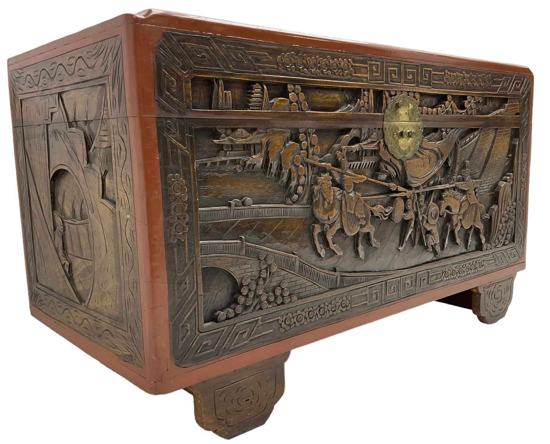 Mid-20th century Singapore camphor wood blanket chest, heavily carved depicting battle scenes and cityscapes 