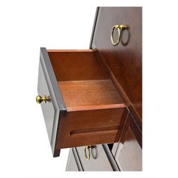 Stag Minstrel - mid-20th century chest, rectangular top over arrangement of three short and four long drawers, on bracket feet