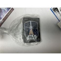 Collection of Star Trek collectors cards to include ‘Alternate Universe’ and ‘Q Continuum’ series, Star Wars cards etc housed in white album
and Harry Potter, Disney and other loose examples