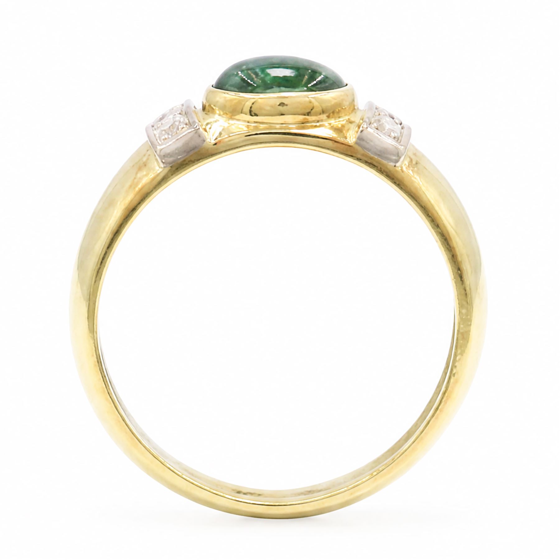 18ct gold tourmaline and diamond ring, bezel set single oval cut tourmaline, with two single cut diamonds set either side, stamped 