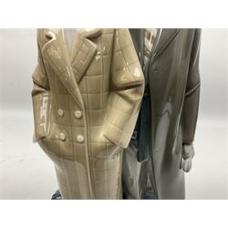 Lladro figure, Sad Parting, modelled as a man and woman with suitcases, sculpted by Francisco Catalá, with original box, no 5583, year issued 1989, year retired 1991, H33cm