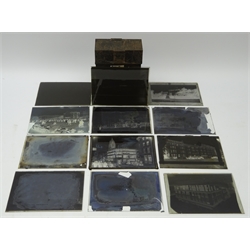  Twelve 1/2 plate negatives, early 20th century incl. Abbotts Hotel, Brighton, Old Ship Hotel, shop fronts, beach views etc in tin case  