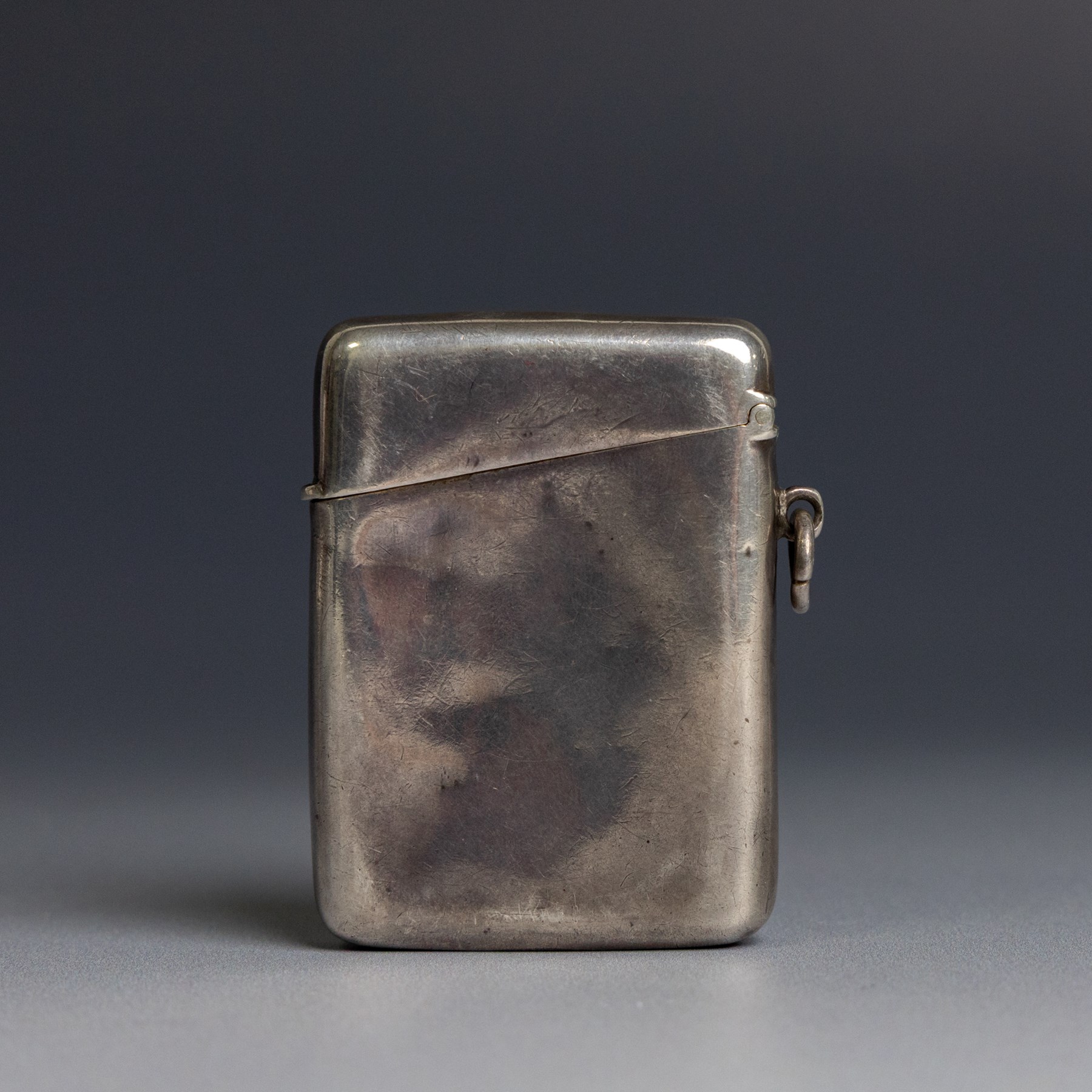 Edwardian silver vesta case, with presentation engraving reading 'The Hartlepools Bye Election 20th June 1910 Mr Arthur Riding from Tho.s Alblewhite Pleasant Memories', hallmarked 	William M Hayes, Birmingham 1909