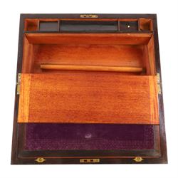 Rosewood writing slope, with brass inlaid decoration, the lid opening to reveal a purple writing slope, H17cm, L51cm