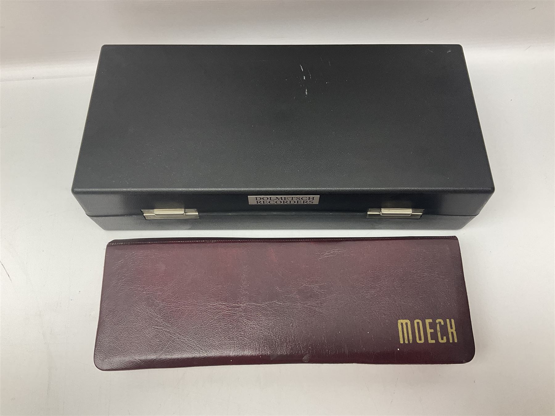 Three wooden recorders - 1970s Schotts 'Concert' three-piece tenor; 1990s Dolmetsch treble, cased; and 1980s Moech descant, cased (3)