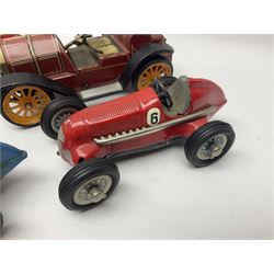 Schuco - seven tinplate model vehicles comprising two 5552 Electro Submarino, two 1050 (2098) racing cars numbered 6 and 8, one blue unnumbered 1050 racing car, one 1225 Mercer 1913 and an unpainted Examico 4001 car 