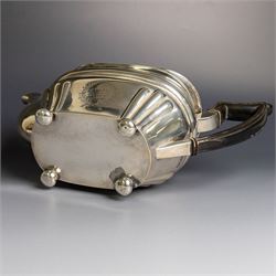 Edwardian silver teapot, of part fluted oval form upon four bun feet, with ebonised handle and finial and presentation engraving to body, hallmarked Thomas Bradbury & Sons, London 1904, H17cm