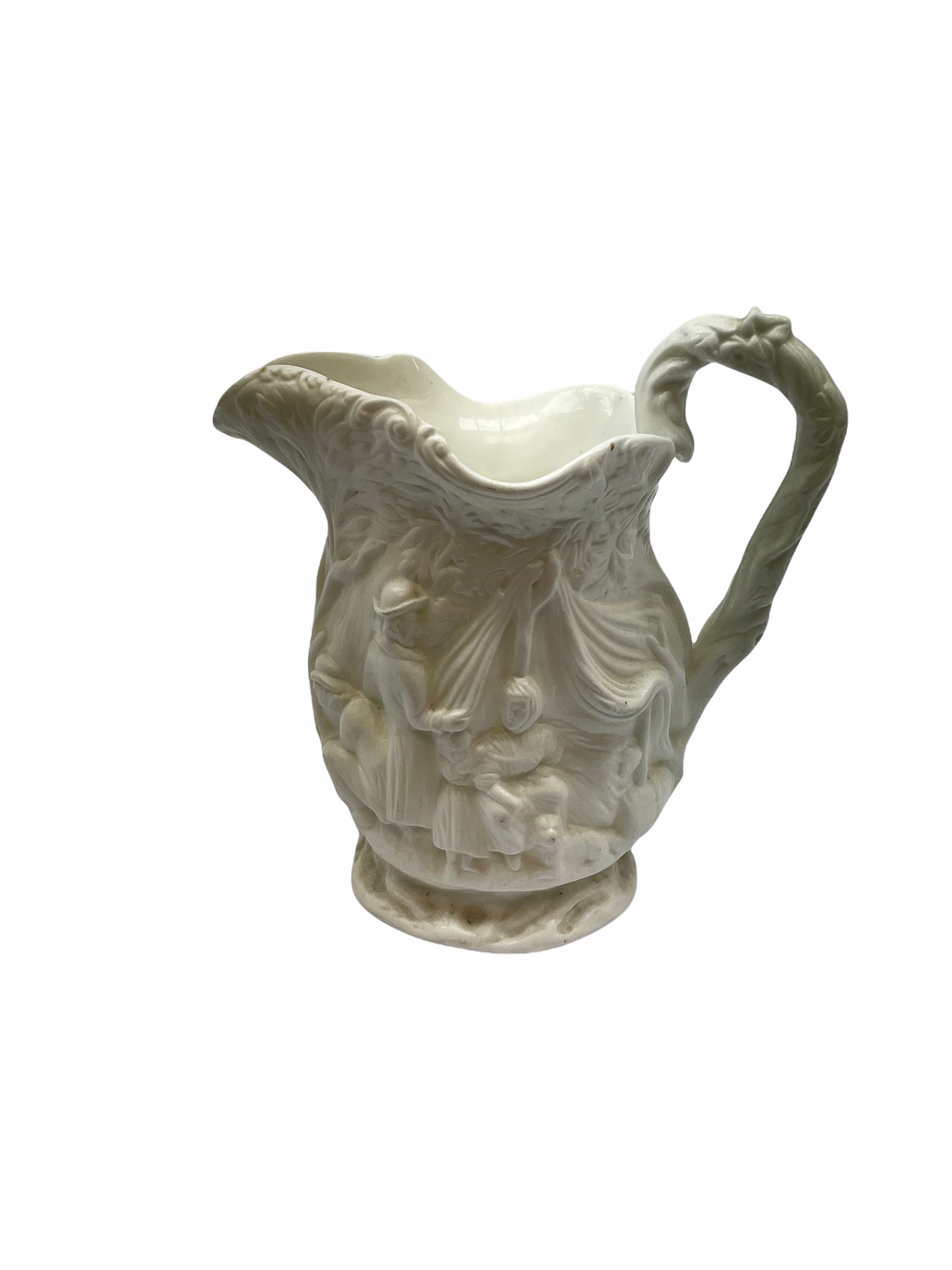 Victorian Parian ware twin handled vase detailed with Bacus masks fruiting vines and floral sprays H36cm, together with a Parian jug H14.5cm, classical Parian sculpture H40cm, decorative plaque decorated in high relief depicting two children D18.5cm. 