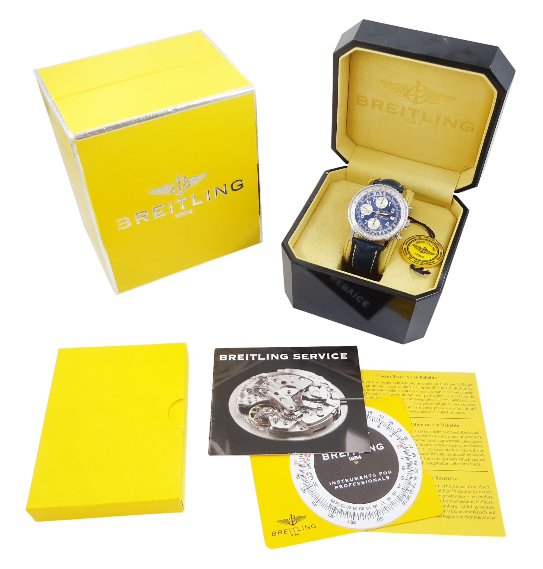 Breitling Old Navitimer gentleman's stainless steel automatic wristwatch, Ref. A13322 serial No. 517301, blue dial with date aperture,  silvered subsidiary dials at 6, 9 and 12 for seconds, 30 minute and 12 hour recording, bi-directional inner slide rule scale, on blue leather strap, boxed with papers and receipt dated 2002
