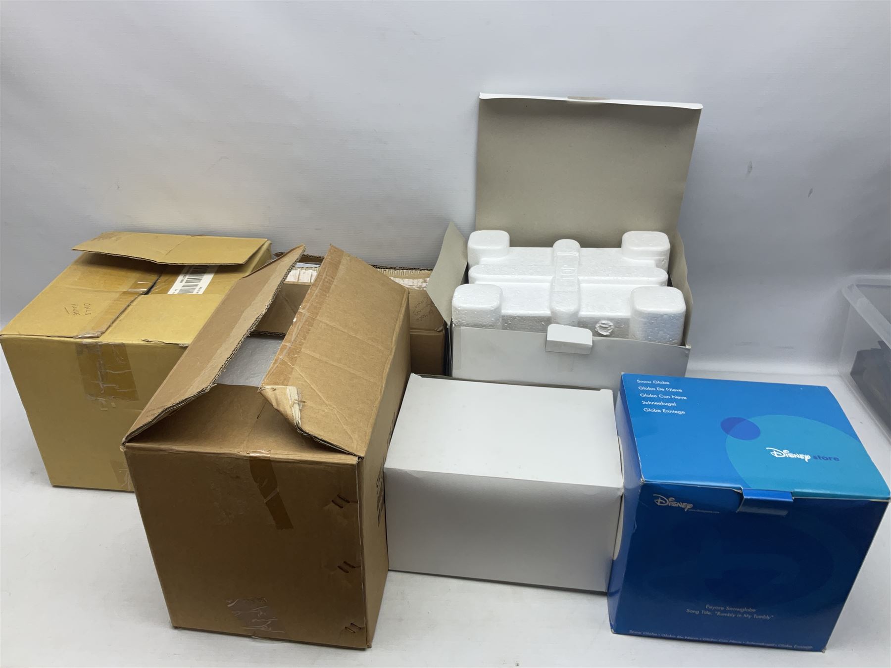 Five Disney Winnie The Pooh snow globes to include The Rain Rain Rain Came Down Down Down, Eeyore Pulling Cart, Owl's House, Rumbly in My Tumbly and Stuck In Rabbit's House, together with figure group with dome, five with boxes (6)