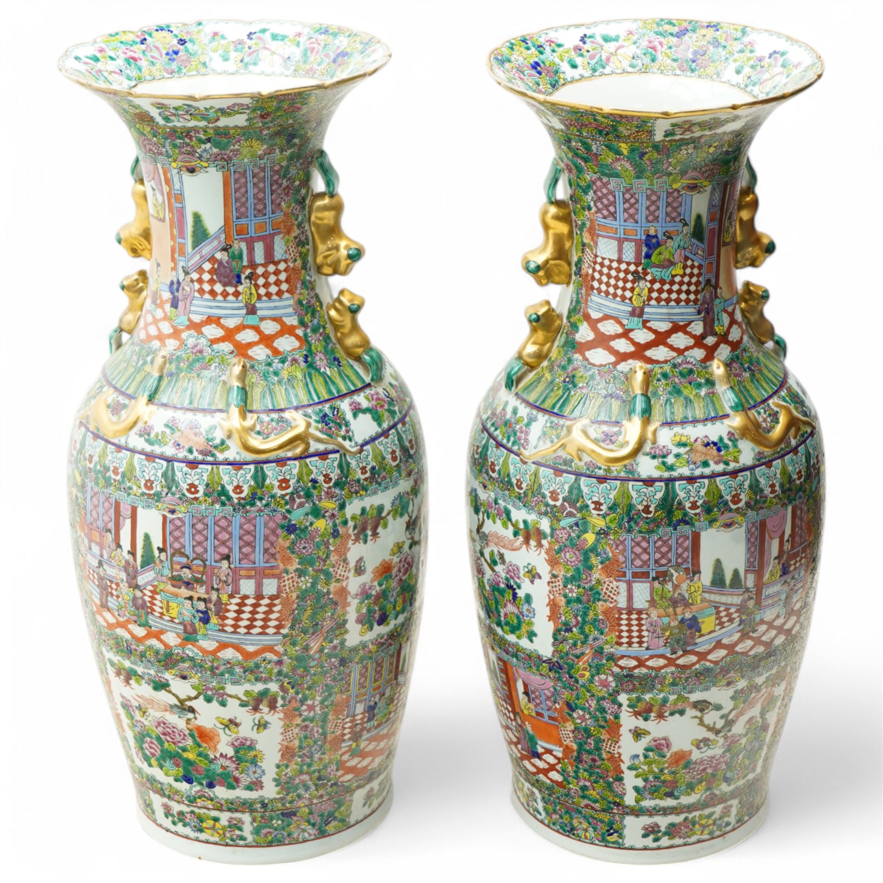 Pair of large 20th century Chinese famille rose floor vases, each of baluster form with waisted neck with gilt foo dog mounted shoulders, and lobed flared rim, decorated with alternating reserves of figures and birds and butterflies amidst blossoming flowers, the white ground profusely detailed with flower heads, each with character mark beneath, H87cm 