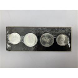 Canadian coinage including Queen Elizabeth II 1964 and four 1966 dollars, 1975 Olympic four coin set comprising two five dollar and two ten dollar coins, 1995 specimen coin set in blue folder, 1995 uncirculated coin set etc 