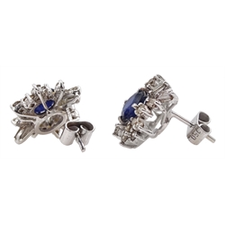 Pair of 18ct white gold oval sapphire, baguette and round brilliant cut diamond stud earrings, stamped 750