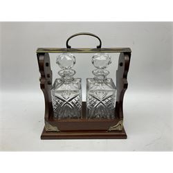 Late 20th century mahogany and silver plated two cut glass decanter tantalus, marked PB&S, with Whisky and Gin Crown Staffordshire ceramic decanter labels, H32cm