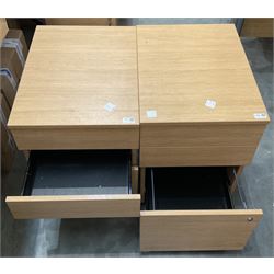 Two light oak effect three drawer pedestals on castors  - THIS LOT IS TO BE COLLECTED BY APPOINTMENT FROM DUGGLEBY STORAGE, GREAT HILL, EASTFIELD, SCARBOROUGH, YO11 3TX