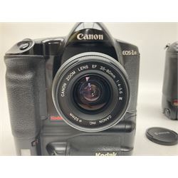 Canon EOS 1n Digital camera body, serial no. 260436, with 'Canon Zoom Lens EF 35-80mm 1:4-5.6 II Canon Inc. 52mm' lens, Kodak Professional DCS 520 digital module, and charger, serial no. K520C03165, together with Nikon F5 camera body with Kodak Professional DCS 760 digital module and charger, serial no. K760C03802