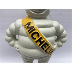 Cast iron figure of Michelin Man, stood on a tyre, H34cm 