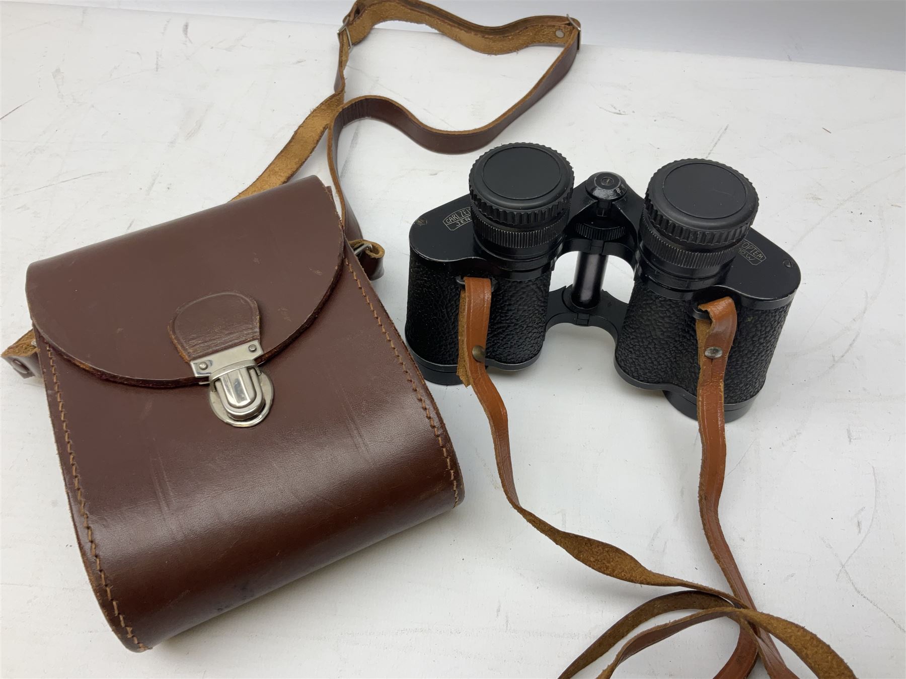 Three pairs of Carl Zeiss Jena binoculars, Jenoptem 10x50W, Jenoptem 8x30W and Deltrintem 8x30W, all cased (3)