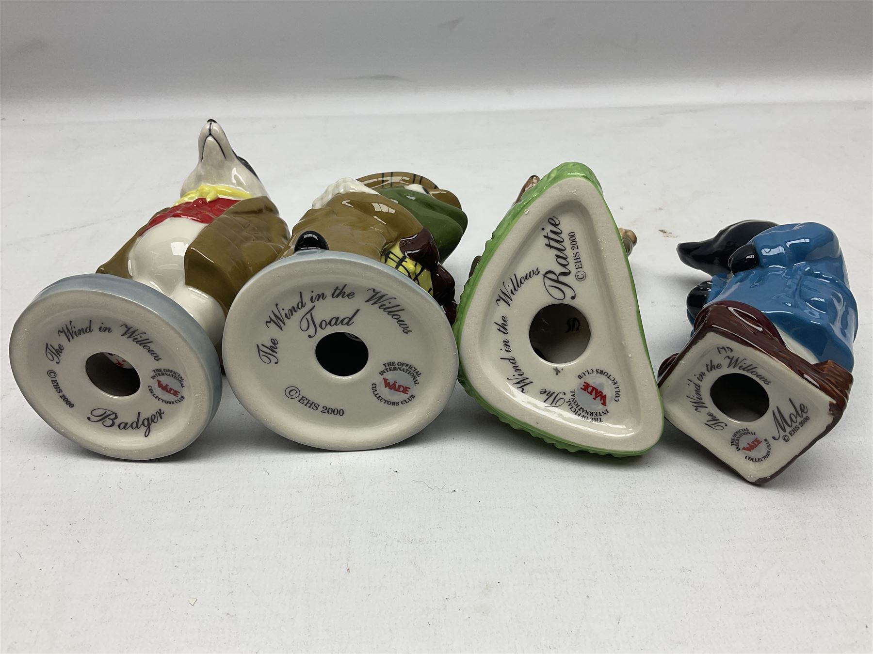 Twelve Wade Collectors Club Figures, comprising six Wind in the Willows figures; Rattie, Mole, Toad, Badger, Weasel and Rattie and Mole on the Water, Six Peter Pan figures; Captain Hook, Peter Pan, Wendy, John, Michael and Tinkerbell  