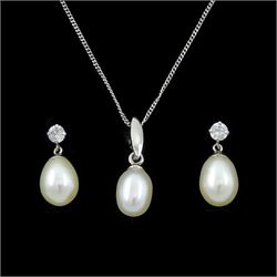 Pair of white gold pearl and cubic zirconia stud earrings and a white gold pearl pendant n...