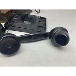 Collection of phone headsets, including GPO bakelite examples, together with other telephone parts 