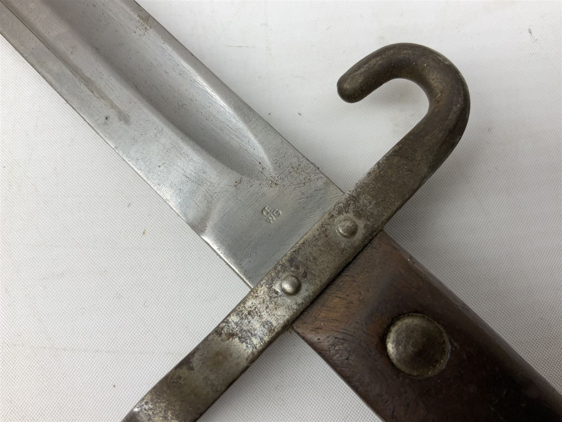 Austrian Model 1895 carbine NCO's knife bayonet with 25cm fullered steel blade; in steel scabbard with webbing frog L39cm overall; and Spanish Model 1941 Bolo bayonet with 25cm fullered steel blade No.6412D; in steel scabbard (2)