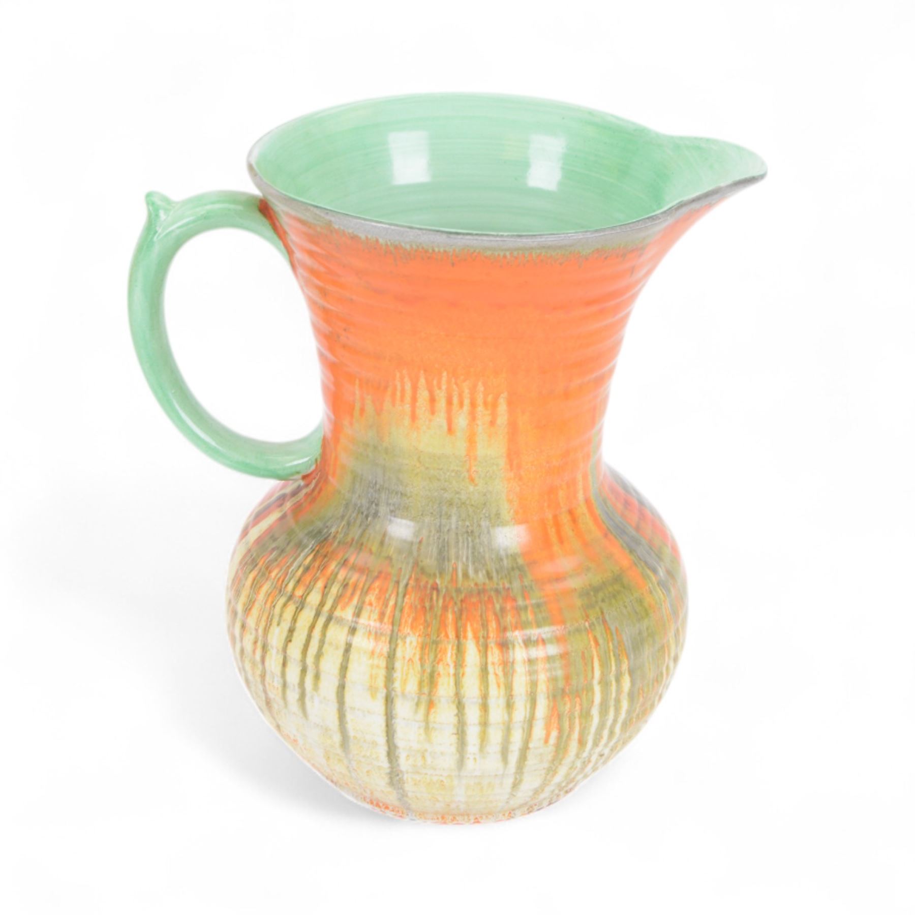 Four pieces of Shelley Harmony dripware, comparing ginger jar and three jugs, largest jug H23cm