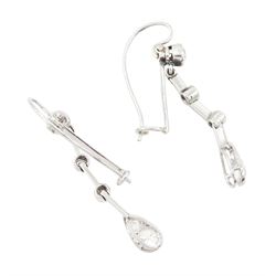 Early 20th century platinum diamond earrings, circa 1930, each pendant milgrain set with old cut diamonds, spaced by knife edge bars, to shepherd's hook back, total diamond weight approx 0.55 carat 