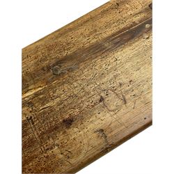 Late Victorian ecclesiastical pitch pine side table, rectangular bow-front top, on shaped end supports pierced with quatrefoils, united by pegged stretcher 