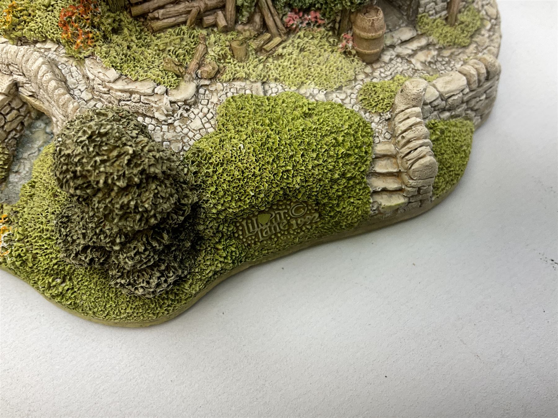 Two limited edition Lilliput Lane cottages, comprising Oakwood Smithy and Blair Athol, both boxed with deeds