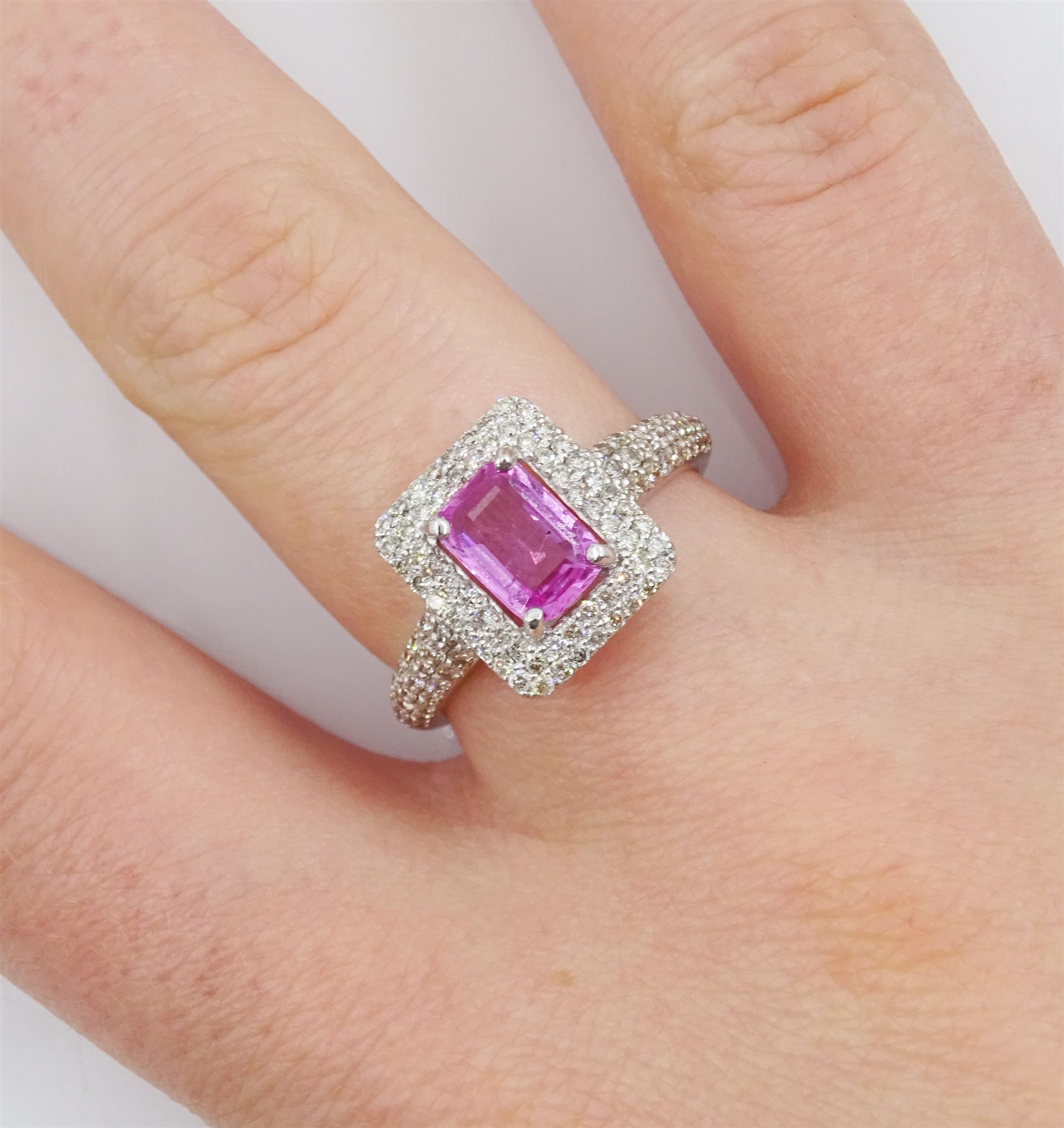 18ct white gold pink sapphire and diamond cluster ring, with diamond set shoulders, stamped sapphire approx 0.85, total diamond weight 0.62