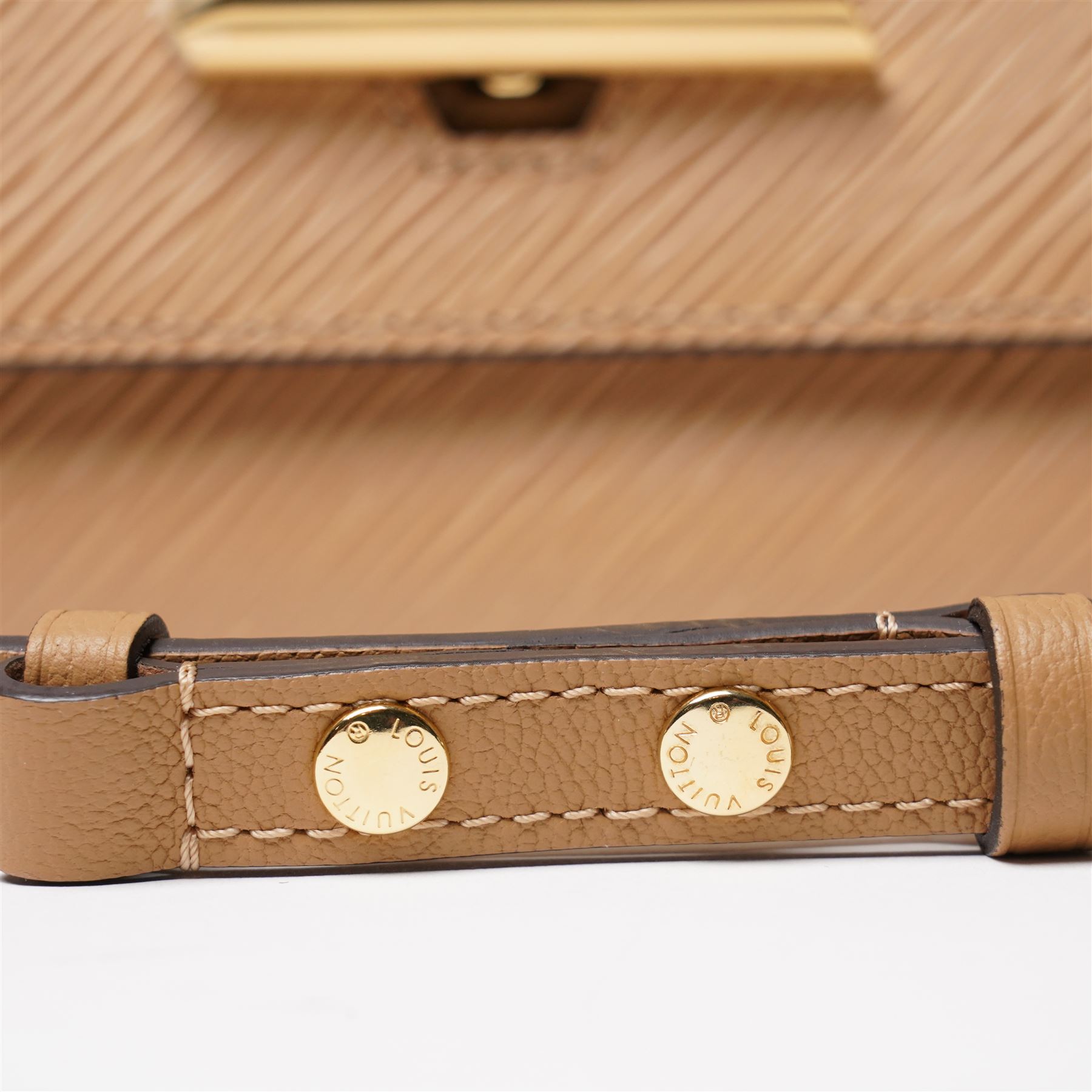 Louis Vuitton - ‘Twist’ MM Bag, the model introduced for the Cruise 2015 collection under Nicolas Ghesquière, in structured beige Epi cow hide leather with black sides, with gold-tone signature LV monogram twist-lock fastening and chain carrying handle, with detachable flat leather shoulder or crossbody strap, unused with original box and dust bag