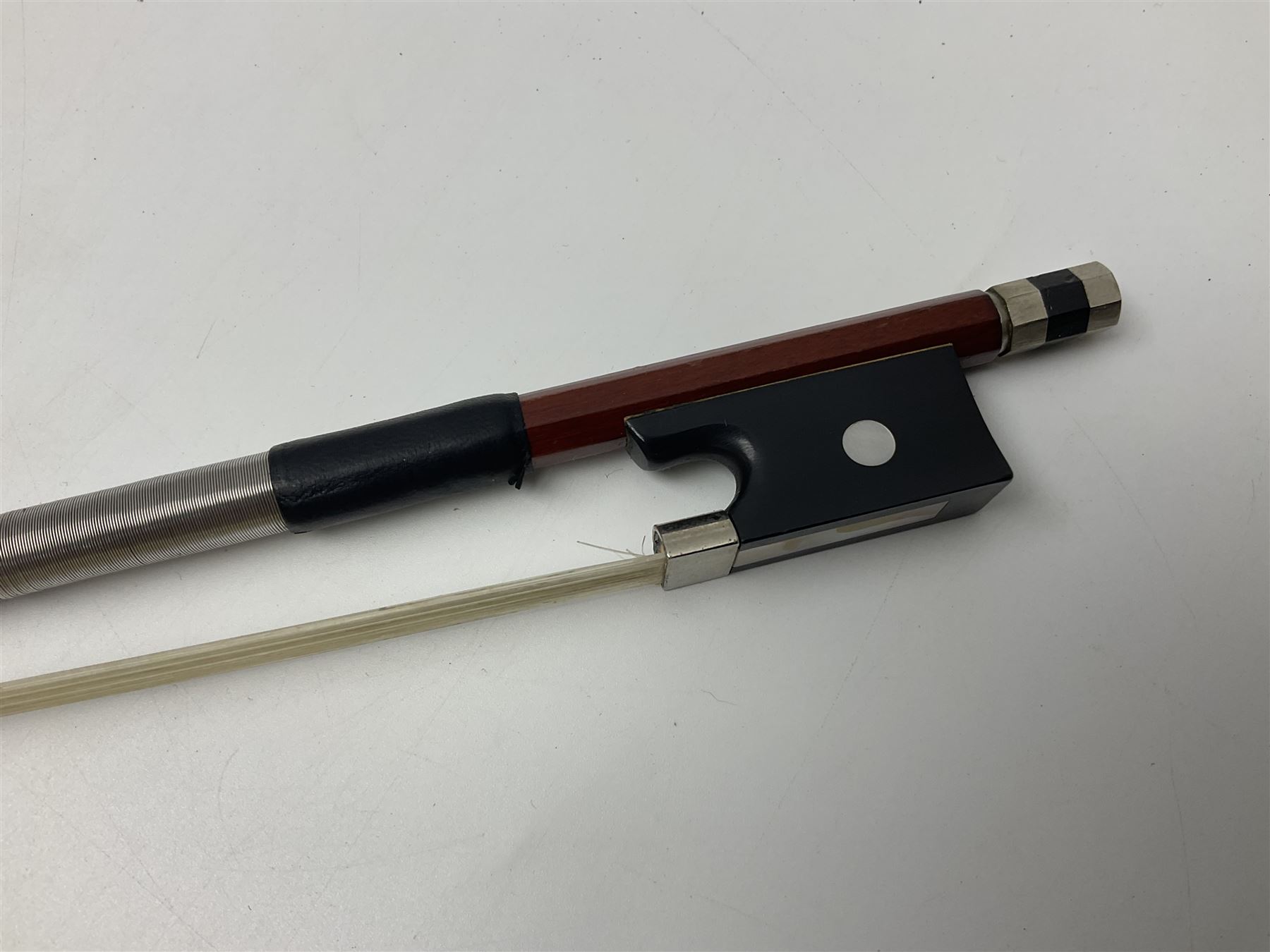 Three Stentor Student violins - three-quarter size with 33cm two-piece back; and two quarter size each with 28cm two-piece back; each in carrying case with bow (3)