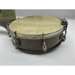 George Formby banjolele with metal plaque to headstock L55cm; in carrying case with instruction booklet.