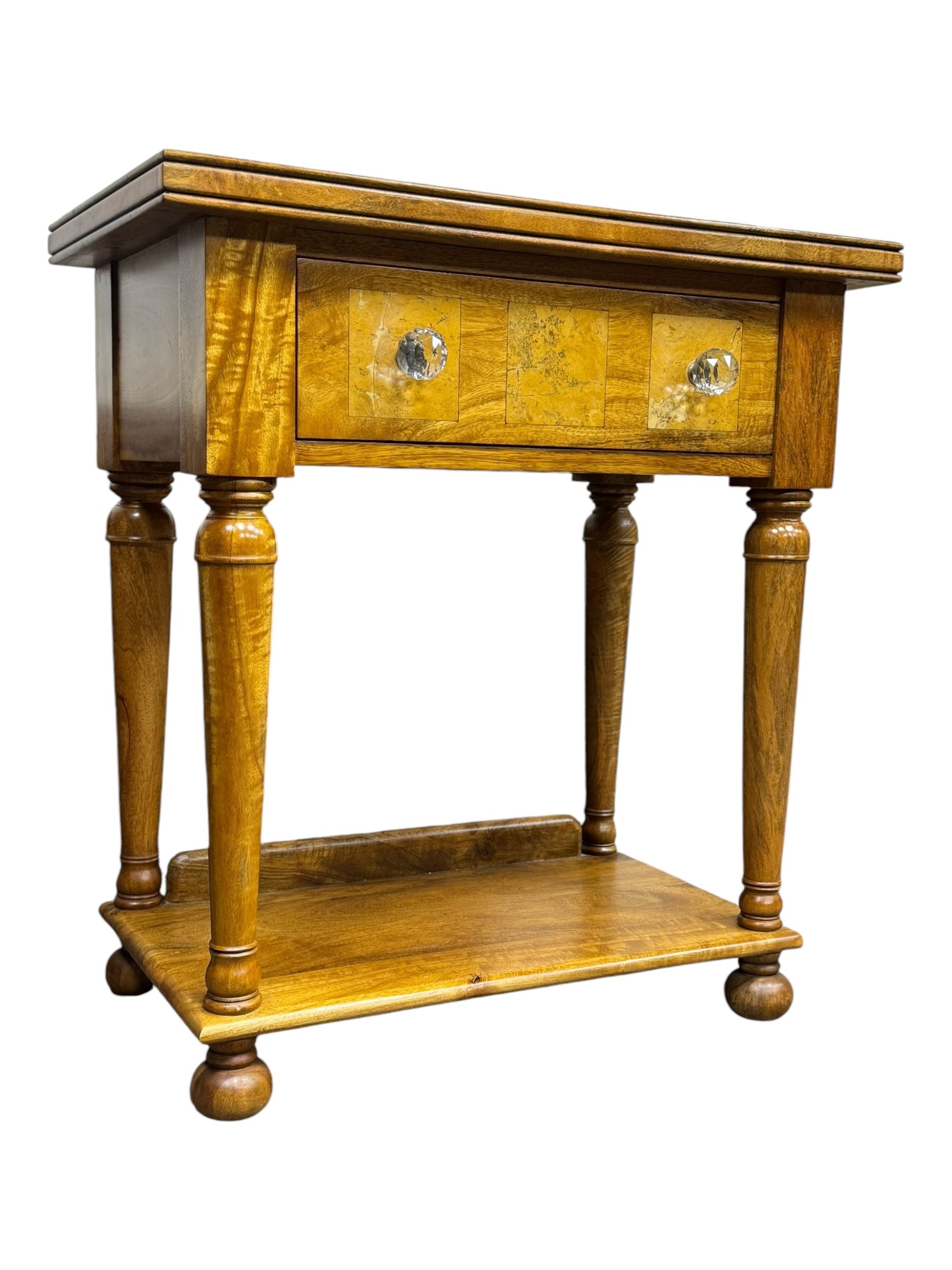 Barker and Stonehouse -  contemporary 'Flagstone' side table, rectangular crossbanded top with central diamond inlay, over single frieze drawer with faceted glass pulls, turned columns and undertier shelf, raised on bun feet