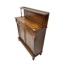 19th century mahogany and brass mounted chiffonier, raised back with gallery supported by turned columns, the rectangular top over single drawer and double cupboard flanked by pilasters, plint base on turned feet