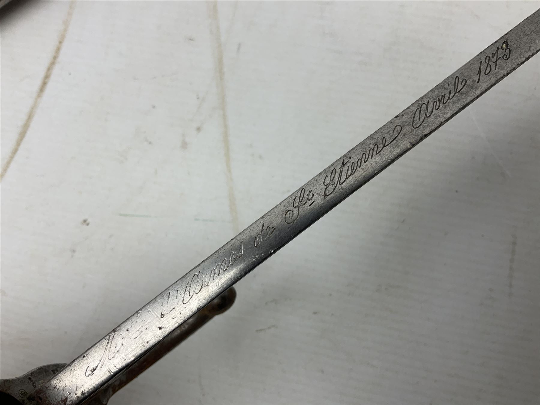 French model 1866 sabre bayonet, the 57.5cm curving blade marked St. Etienne 1873; in associated steel scabbard L71cm; and Mosin-Nagant M1891 socket bayonet with 43cm cruciform blade No.37068 (no scabbard) (2)