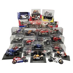 Fifty-one die-cast models of motorcycles by Maisto, Protar Italeri, Welly etc; many in perspex display boxes, some in window boxes and some unboxed