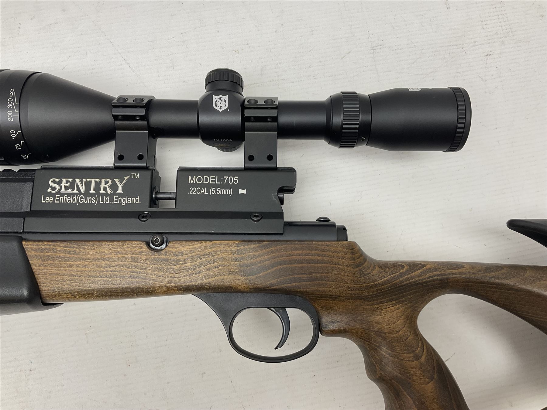 Lee Enfield Sentry Model 705 .22 cal. PCP rifle, with Nikko Stirling Mountmaster 4-12 x 50 scope and wooden stock with pistol grip; serial  no.112117897, L104.5cm overall; in soft carrying case  NB: AGE RESTRICTIONS APPLY TO THE PURCHASE OF AIR WEAPONS.