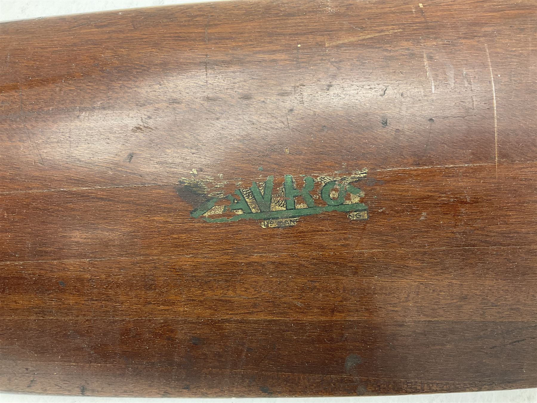 Early 20th century Avro 504 80HP Gnome laminated mahogany two-blade propeller with metal centre to the hub, stamped to the face of the hub 'AVRO Y80 80HP GNOME TYPE 504 & 504A A.I.D.29 A.I.D.32 1545' and to the sides of the hub '2744 DIA 1829 PITCH' and '1470'; traces of A.V. Roe & Co Ltd Manchester transfers to both blades L273.8cm; Auctioneer's Note: The Avro 504 was introduced in 1913 and was quickly taken up by the Royal Flying Corps as a trainer and observation machine; robust and versatile it remained in general service as a trainer until the late 1920s then widely for civilian use as a joy-rider and for stunt displays. The legendary RAF WWII ace, Douglas Bader, took instructions and would have had his first solo flight in just such a machine.