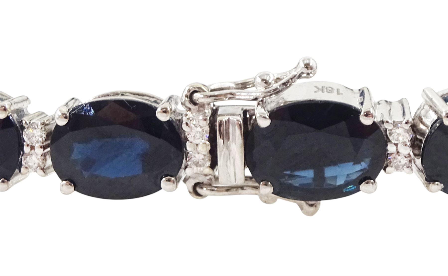 18ct white gold oval cut sapphire and round brilliant cut diamond bracelet, stamped, total sapphire weight approx 29.50 carat, total diamond weight approx 0.45 carat